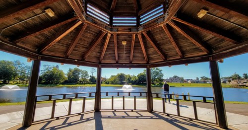 A man admires the view of a lake in New Jersey.