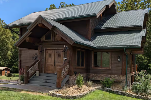 Exterior of a cabin in Marion, Virginia, with wooden exterior and front door