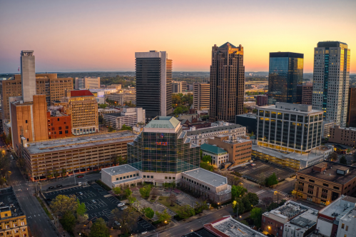 Various buildings in downtown Birmingham at sunset