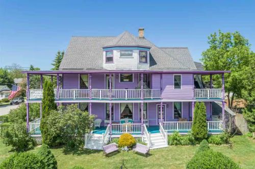 A purple Victorian-era bed and breakfast