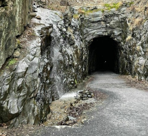 The Blue Ridge Tunnel entrance, a vast opening in the side of a mountain.