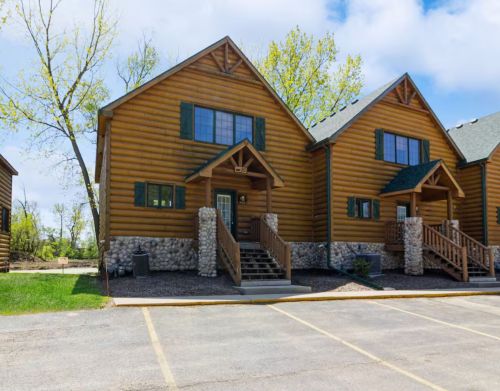 Exterior view of large connected cabins.