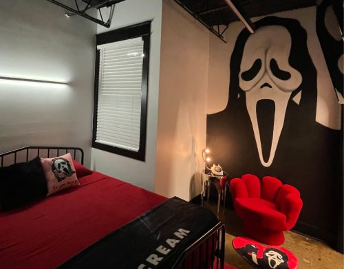 A mural of the main character from Scream in a bedroom