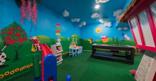 A whimsical playroom inside an Alice in Wonderland inspired Airbnb in Ozark, MO