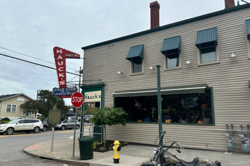 Exterior of Hauck's Corner, a neighborhood bar in Louisville serving sandwiches, salads, and pizza