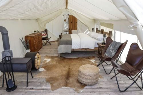 A luxury camping tent with a high-quality decor