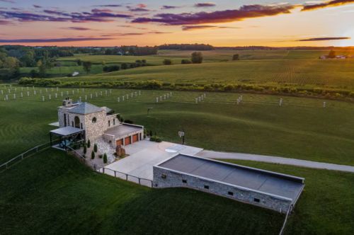 An Italian-themed home overlooking a vineyard