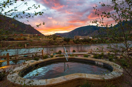 A sunset with the pools in the foreground