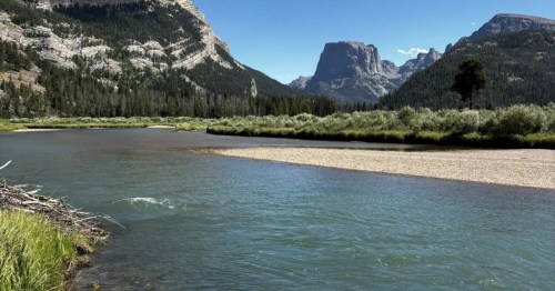 A wide river leads to Squaretop Mountain near Dubois, Wyoming.