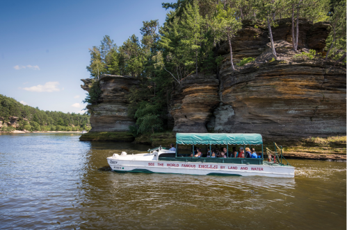 An Original Wisconsin Ducks boat floating along the Wisconsin River