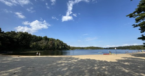 kayakers on the beach of olney pond at lincoln woods state park in lincoln rhode osland