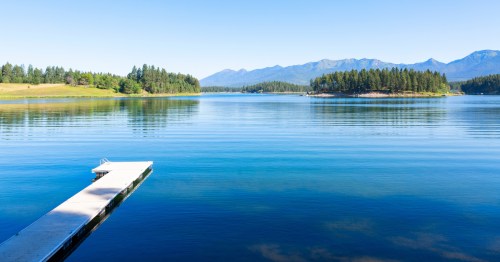 A small dock on Echo Lake in Montana on a summer day.