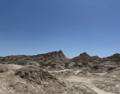 A desolate landscape with rock formations