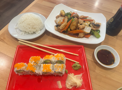 Wooden table with various Japanese dishes on top