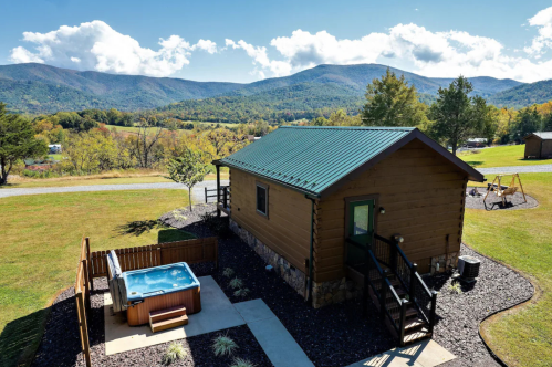 Exterior of a cabin in Luray, Virginia, with hot a tub and mountain views