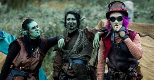 Three people dressed as ogres for the Washington Midsummer Renaissance Faire in Snohomish, Washington