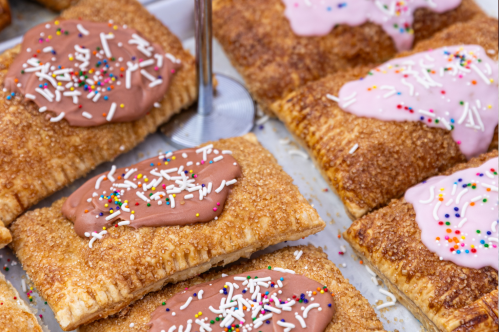 View of homemade Pop-Tarts topped with icing and sprinkles