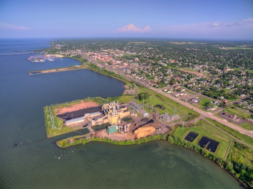 Photo source: https://stock.adobe.com/images/ashland-wisconsin-and-power-plant/197373939?prev_url=detail Ashland is a small coastal town on Lake Superior