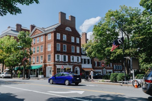 Traffic and historic buildings on Nassau St in downtown, Princeton, New Jersey