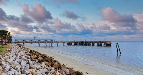 a pier and seawall of st. simons island georgia