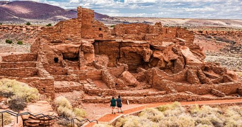 A paved hiking trail leads to the pueblo ruins at Wupatki National Monument near Flagstaff Arizona.