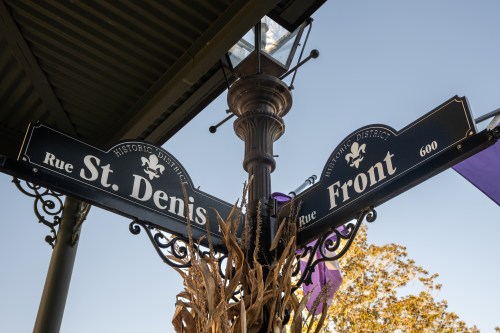 Street signs at Rue St. Denis and Rue Front in the Historic District have a fleur-de-lis design