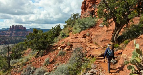 A Woman Hikes the Airport Loop Trail, Sedona, AZ