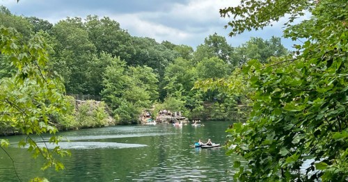 people floating on the river in Garrettsville, Ohio in summer
