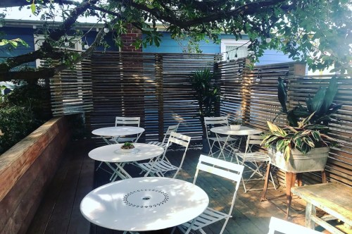Outdoor seating at The Harbinger.