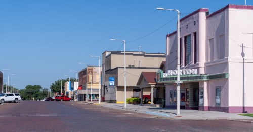 Looking down a main street covered in bricks in Norton, Kansas.