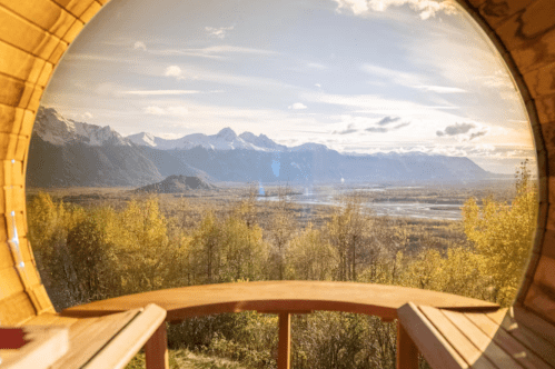 View of mountains and fall foliage from a sauna at an Airbnb