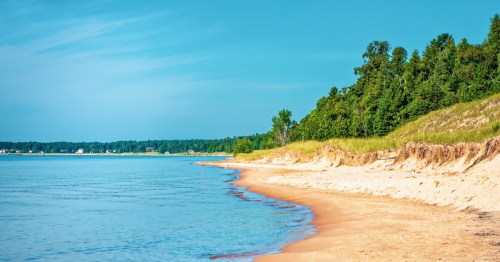 A gorgeous shot of the sunny Whitefish Dunes State Park