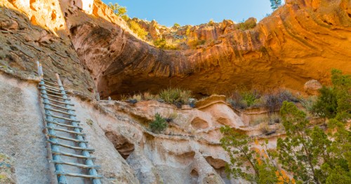 a ladder leads to an ancient dwelling at Bandelier National Monument, New Mexico
