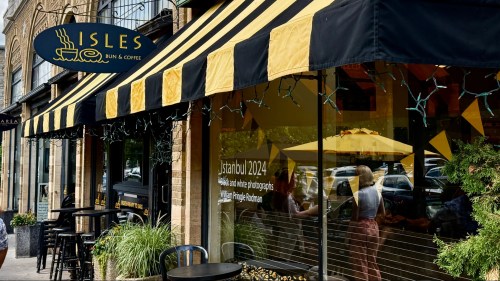 Yellow and black signage at a charming small town bakery.