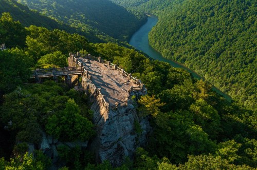 Aerial panoramic image of the Cheat River gorge and the Coopers Rock overlook and viewing platform in summer