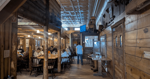 Inside the log cabin feeling deco of Beau Jo's pizza