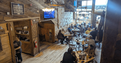 Inside the log cabin feeling decor of Beau Jo's pizza