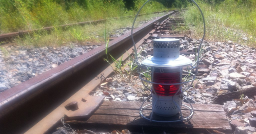 Old lantern placed on the railroad tracks in Gurdon, Arkansas, symbolizing the mysterious Gurdon Light.