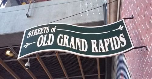 A sign that says “Streets of Old Grand Rapids.”