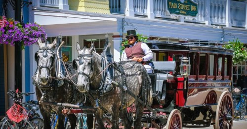 Horse and carriage ride at Mackinac Island, a popular tourist destination in Michigan.