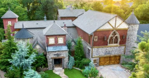 aerial of the Scarlet Manor, a massive castle-like airbnb in Norman Oklahoma