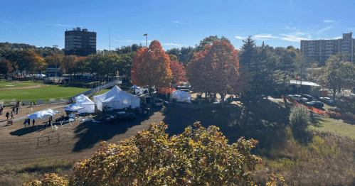 aerial shot of the festival grounds of autumnfest along with fall foliage in woonsocket rhode island