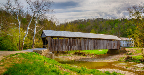 also known as the mackey-hughes bridge, cabin creek covered bridge is a historic covered bridge in Cabin Creek Road near Cottageville, KY