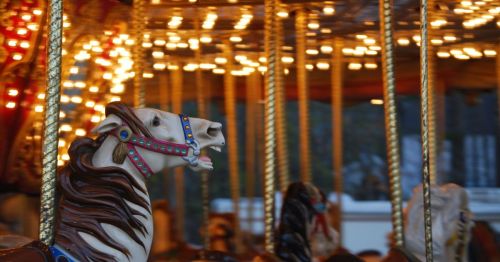 A carousel horse on a carousel.