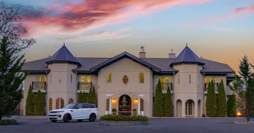 A luxury castle in West Virginia at sunset.