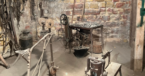 Dusty tools in a brick underground tunnel in Ellinwood