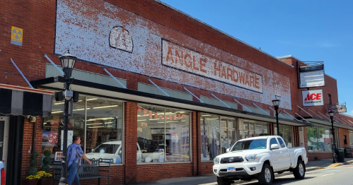Storefront of Angle Hardware in Rocky Mount, VA under bright blue sky
