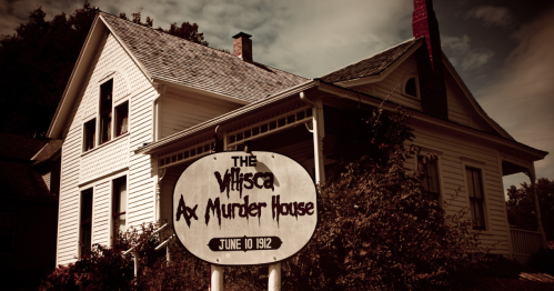 The front of the Viscilla Axe Murder House during a storm.