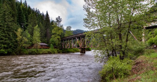 A steel bridge crosses over the St. Joe River in the small town of Avery, Idaho.