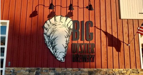 Exterior of brewery that says "Big Oyster"